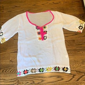 White coverup with pink crochet detail